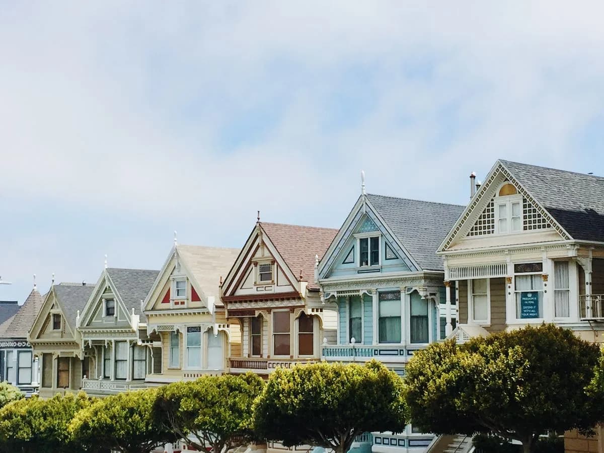 Row of well-kept residential homes in an established neighborhood
