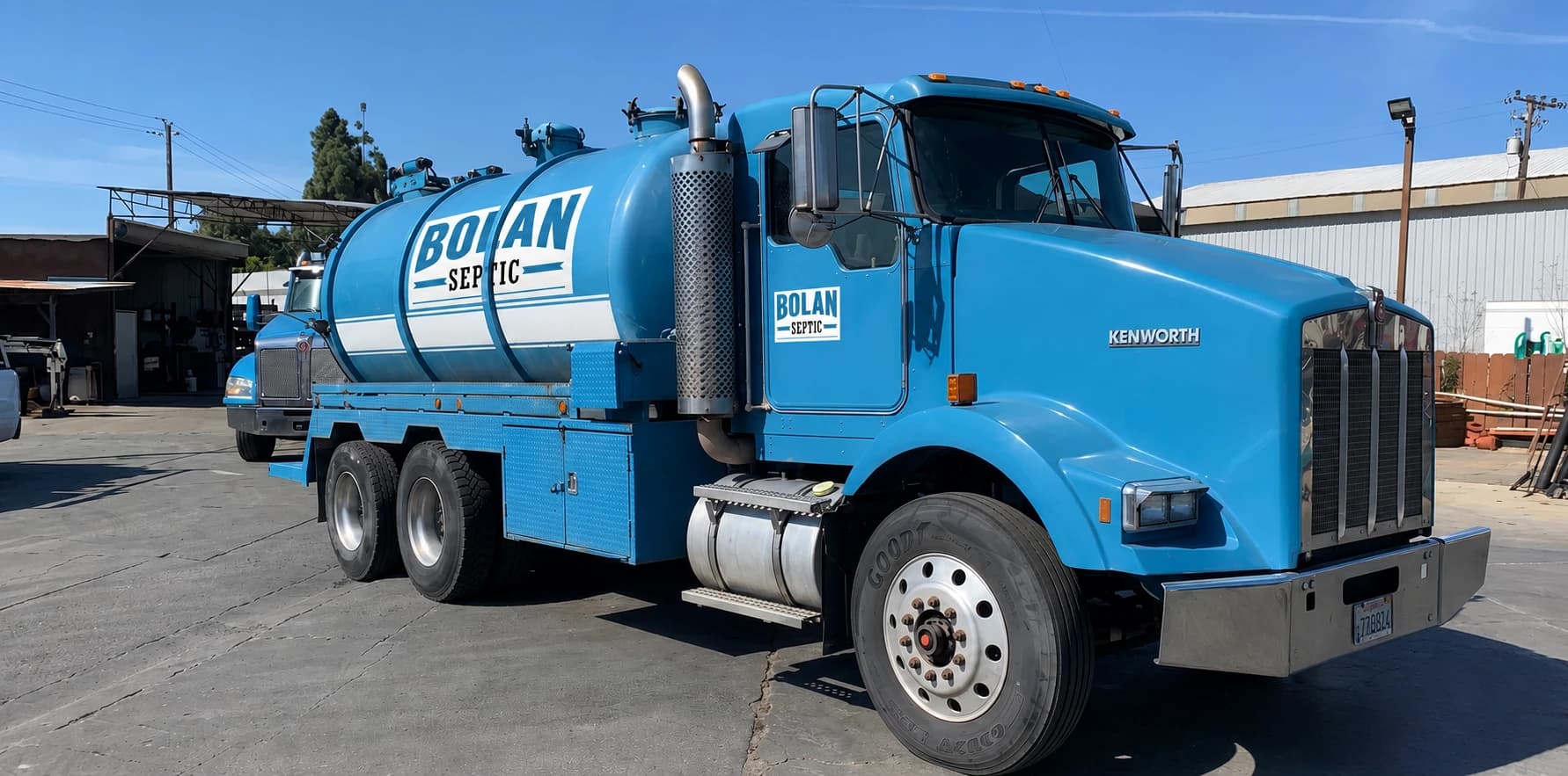 Bolan Septic pump truck parked at the yard